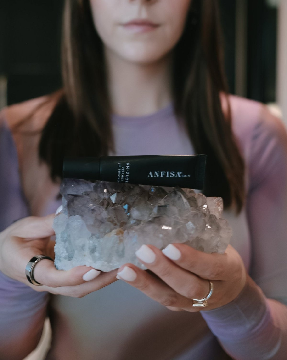 katherine holding crystal and anifsa lip gloss